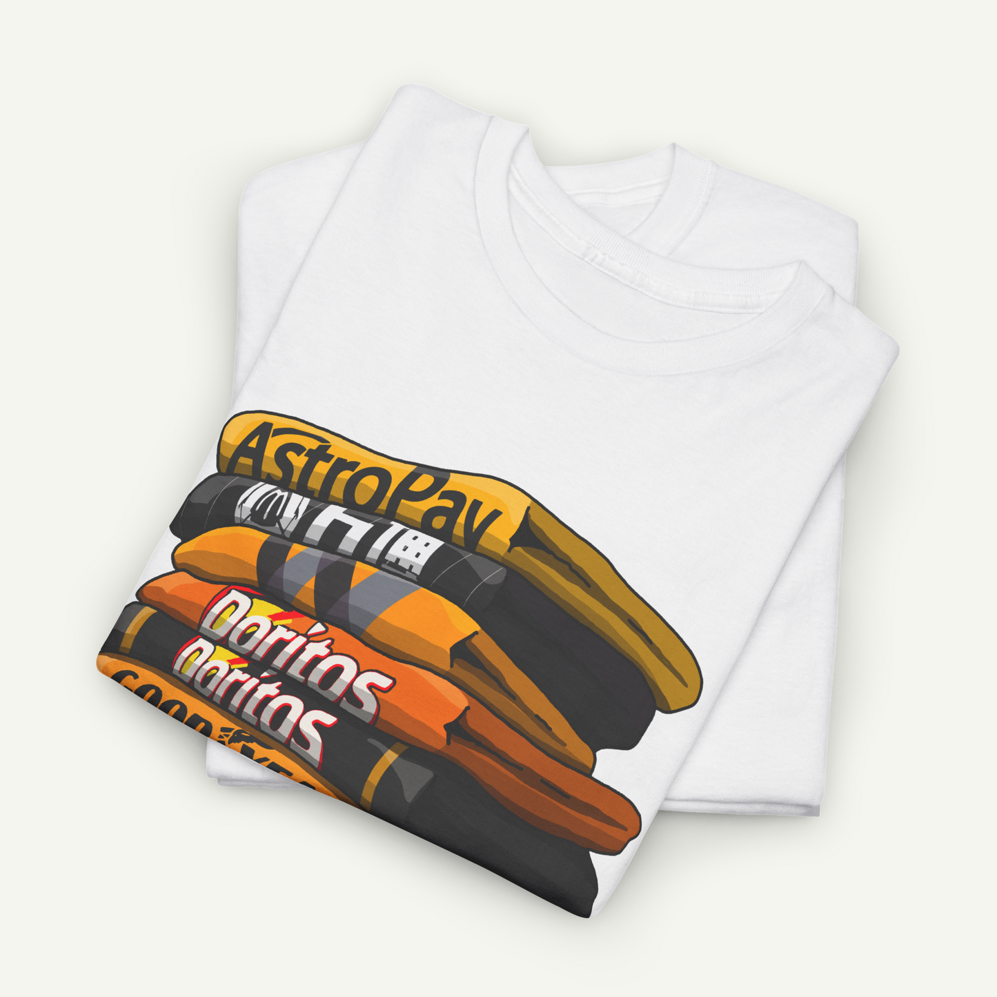 A white t-shirt with a graphic design depicting a stack of colorful books or magazines.