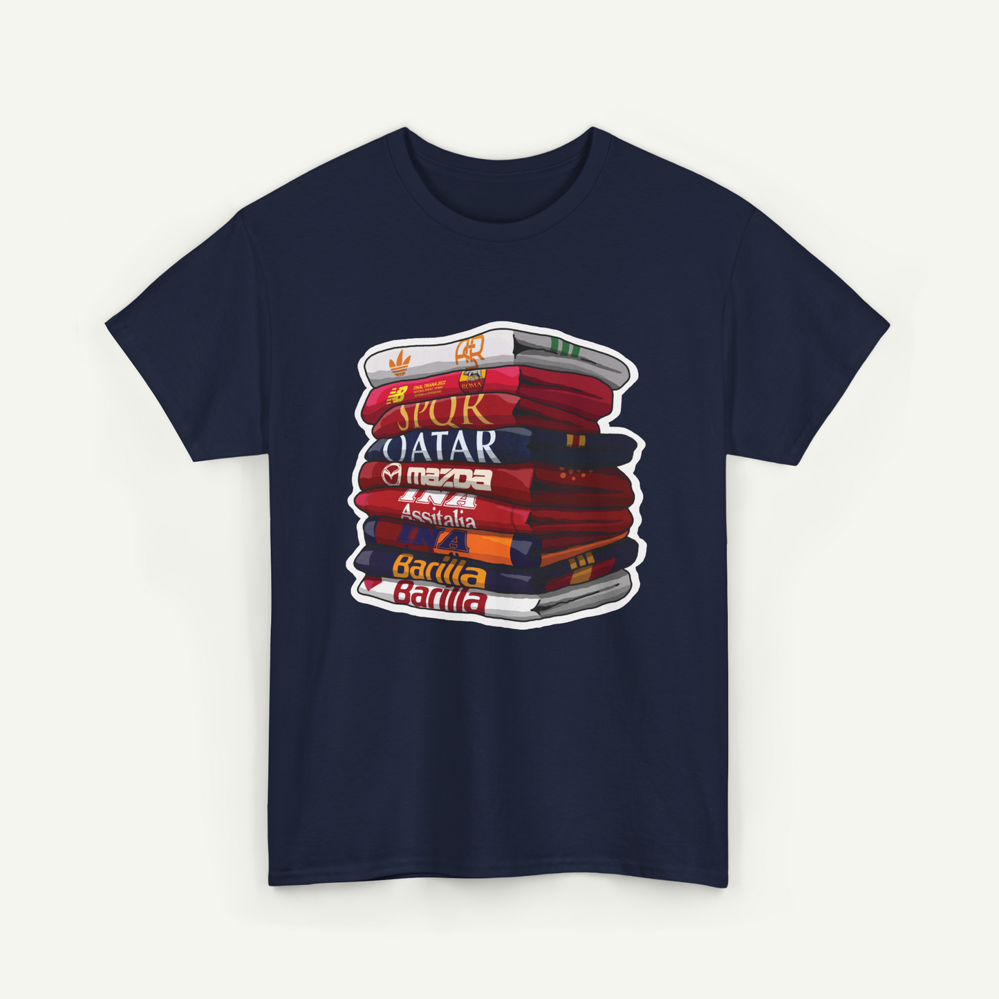 A navy blue t-shirt with a graphic design depicting a stack of colorful books with various text on the spines.