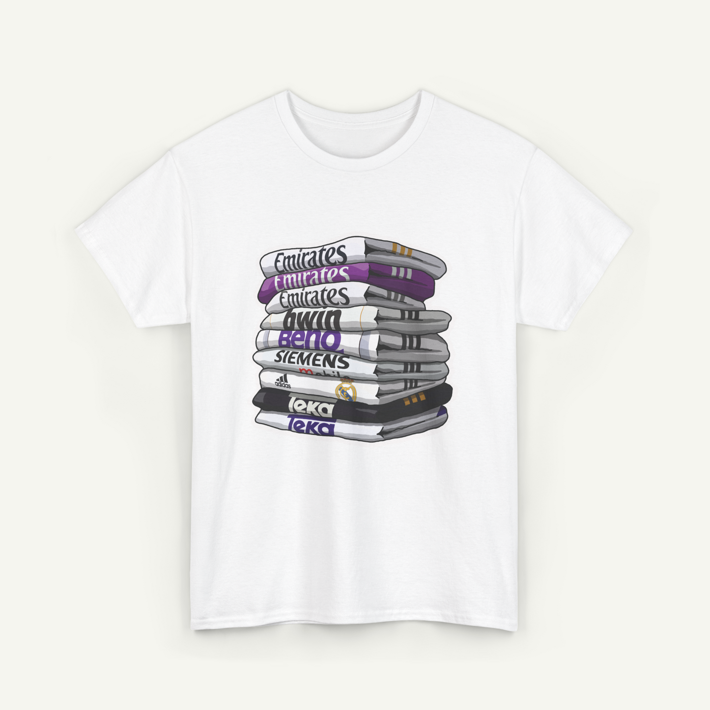 A white t-shirt with a graphic design depicting a stack of books with various text labels on the spines.