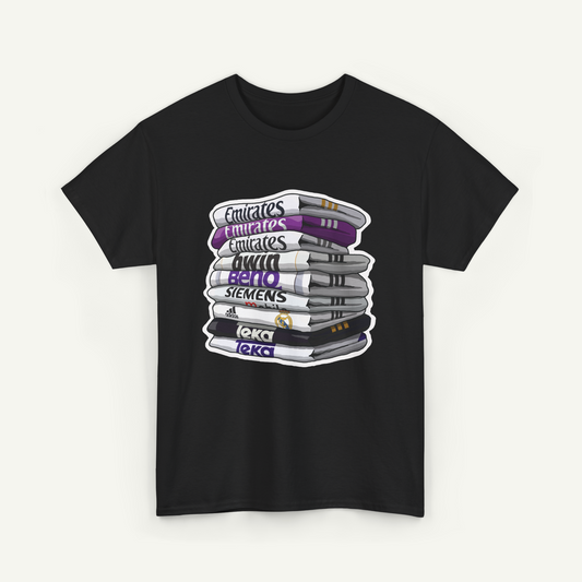 A black t-shirt with a graphic design depicting a stack of books with various text labels on the spines.