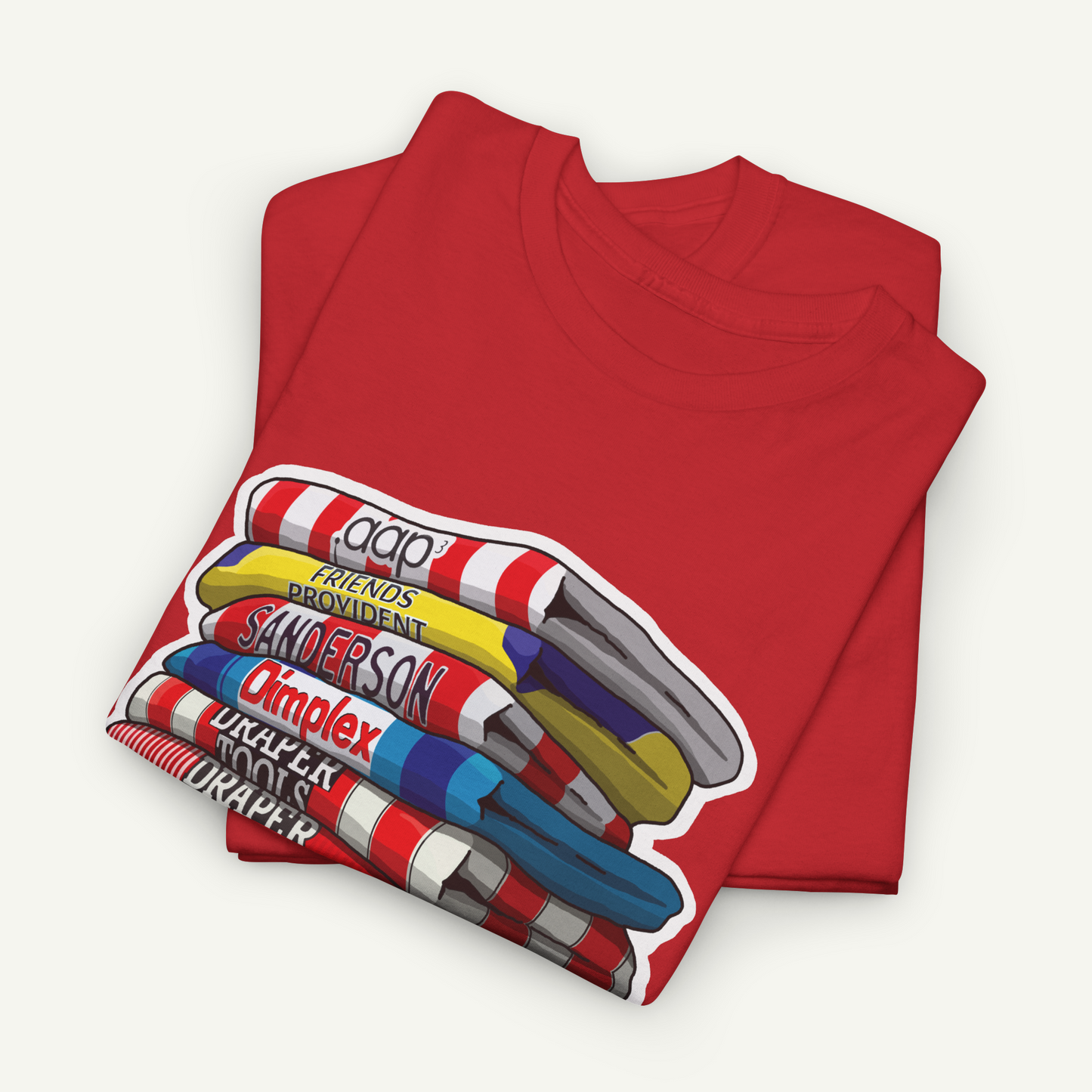 A red t-shirt with a graphic design depicting a stack of colorful markers or highlighters.