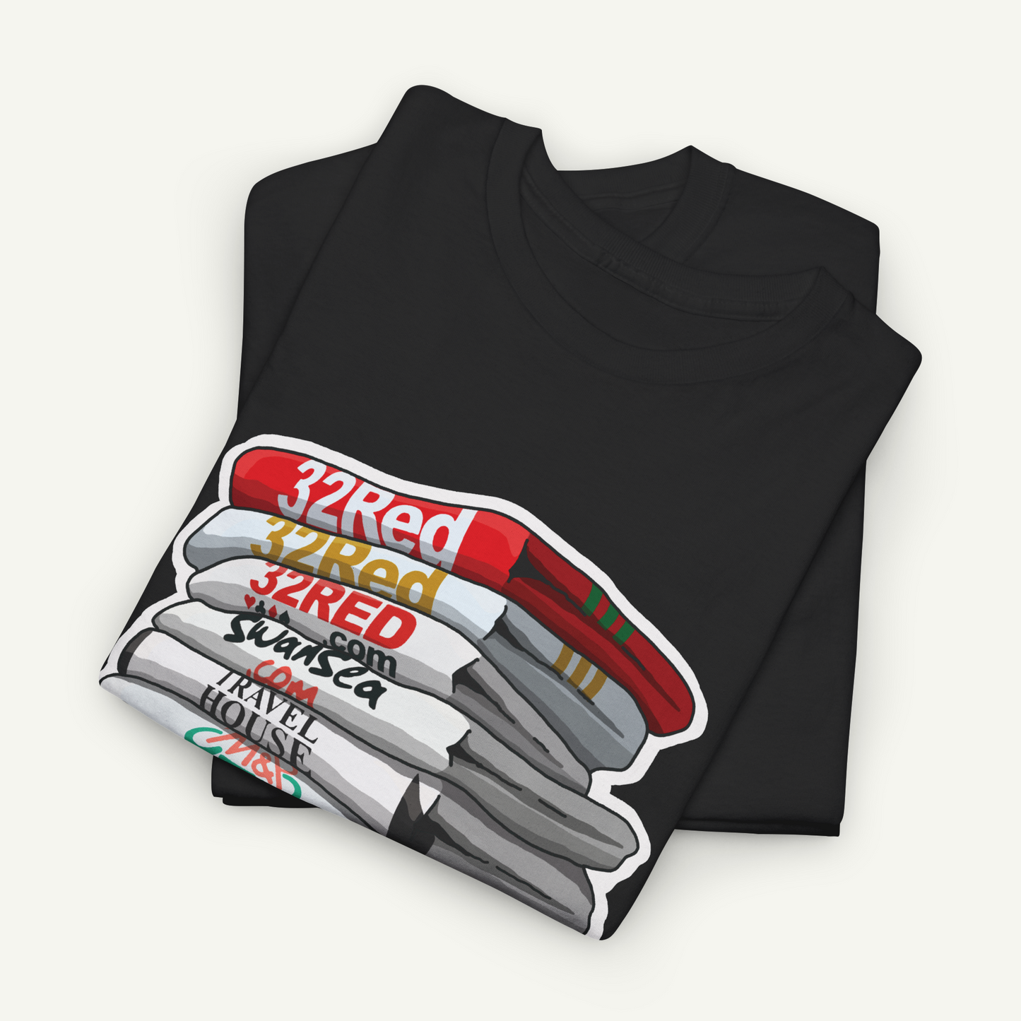 A black t-shirt with a graphic design depicting a stack of colored pencils in various shades of red, white, and gray.