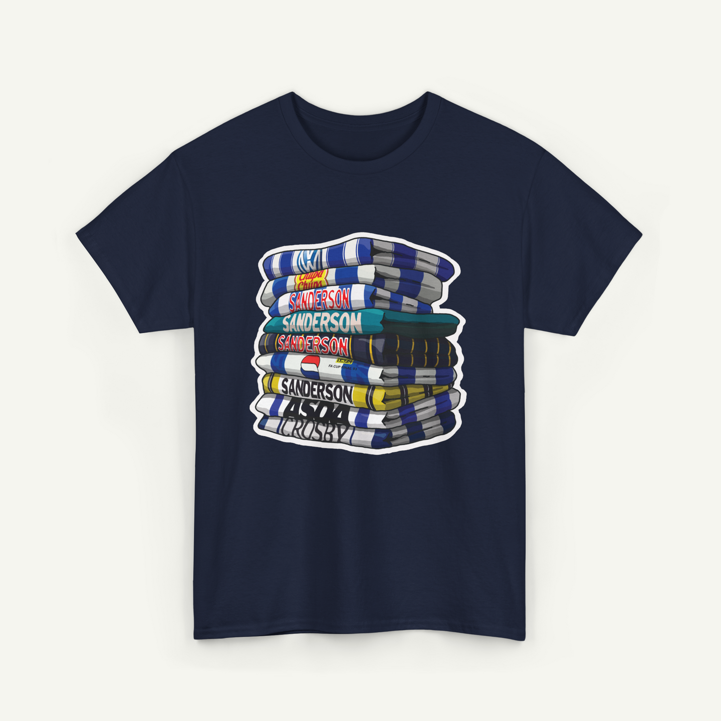 A navy blue t-shirt with a graphic design depicting a stack of colorful books or magazines.