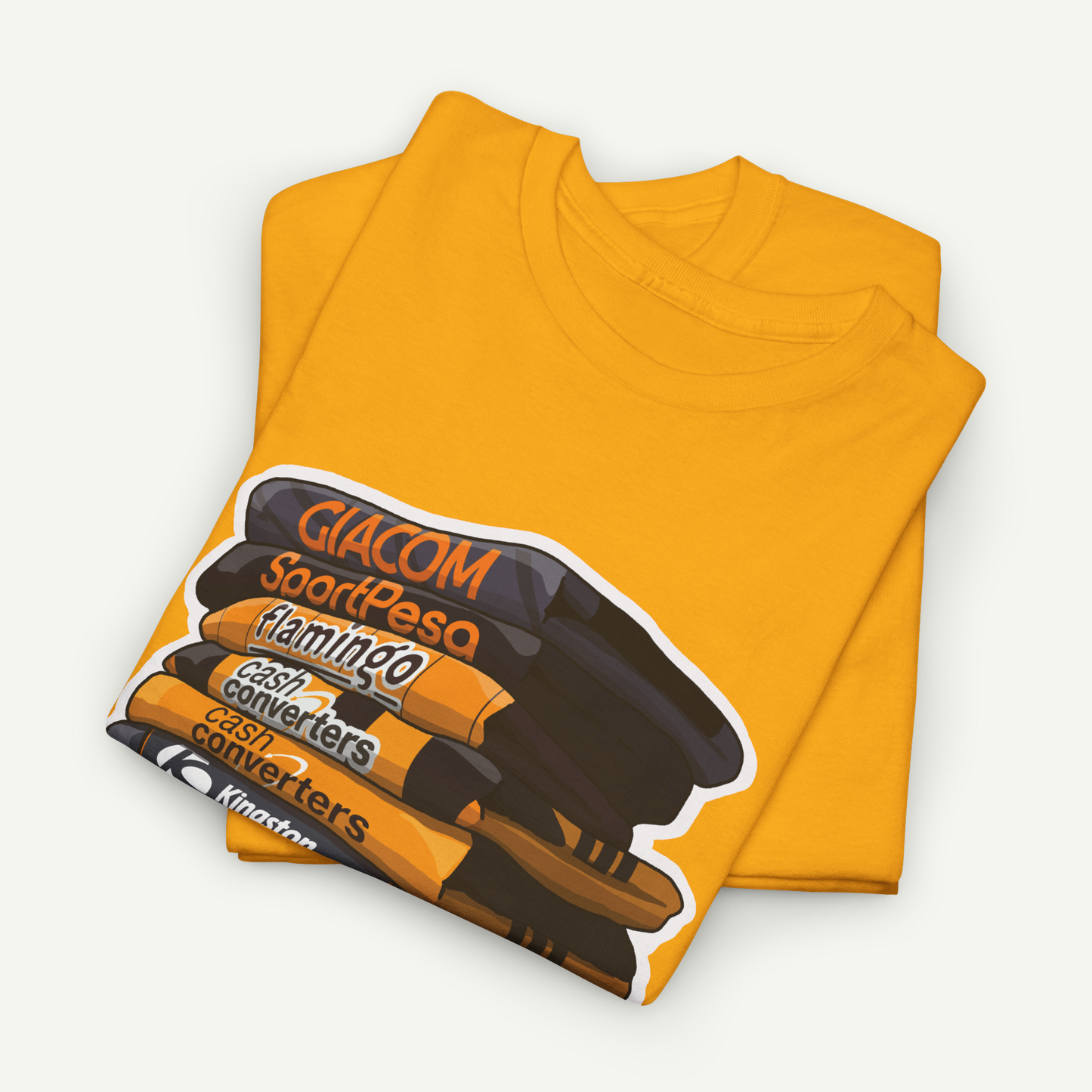 a yellow t-shirt with a graphic design featuring a stack of various objects, including a flamingo, cash converters, and a stack of books.