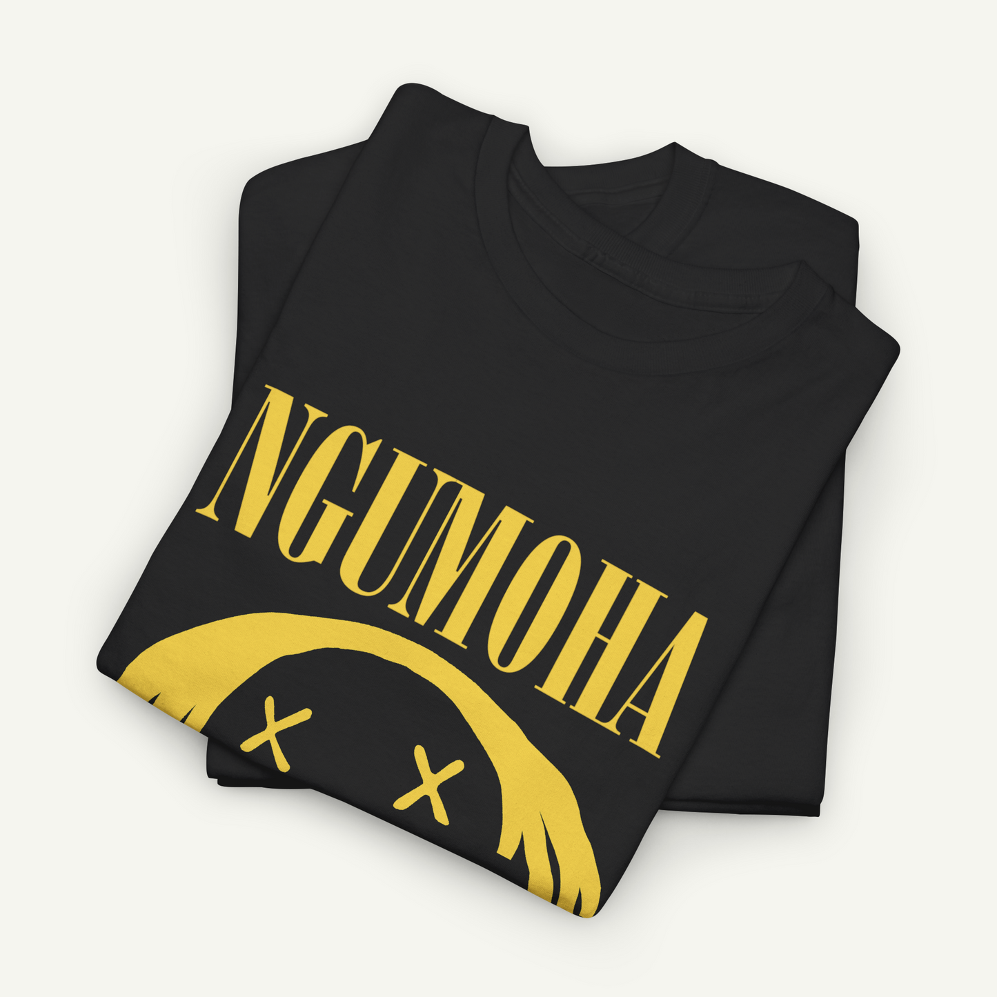 A black t-shirt with the text "Ngumoha" printed on it in yellow.
