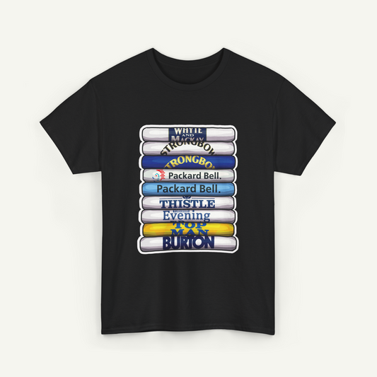 A black t-shirt with a graphic design featuring a stack of seven books with various titles and logos printed on them.