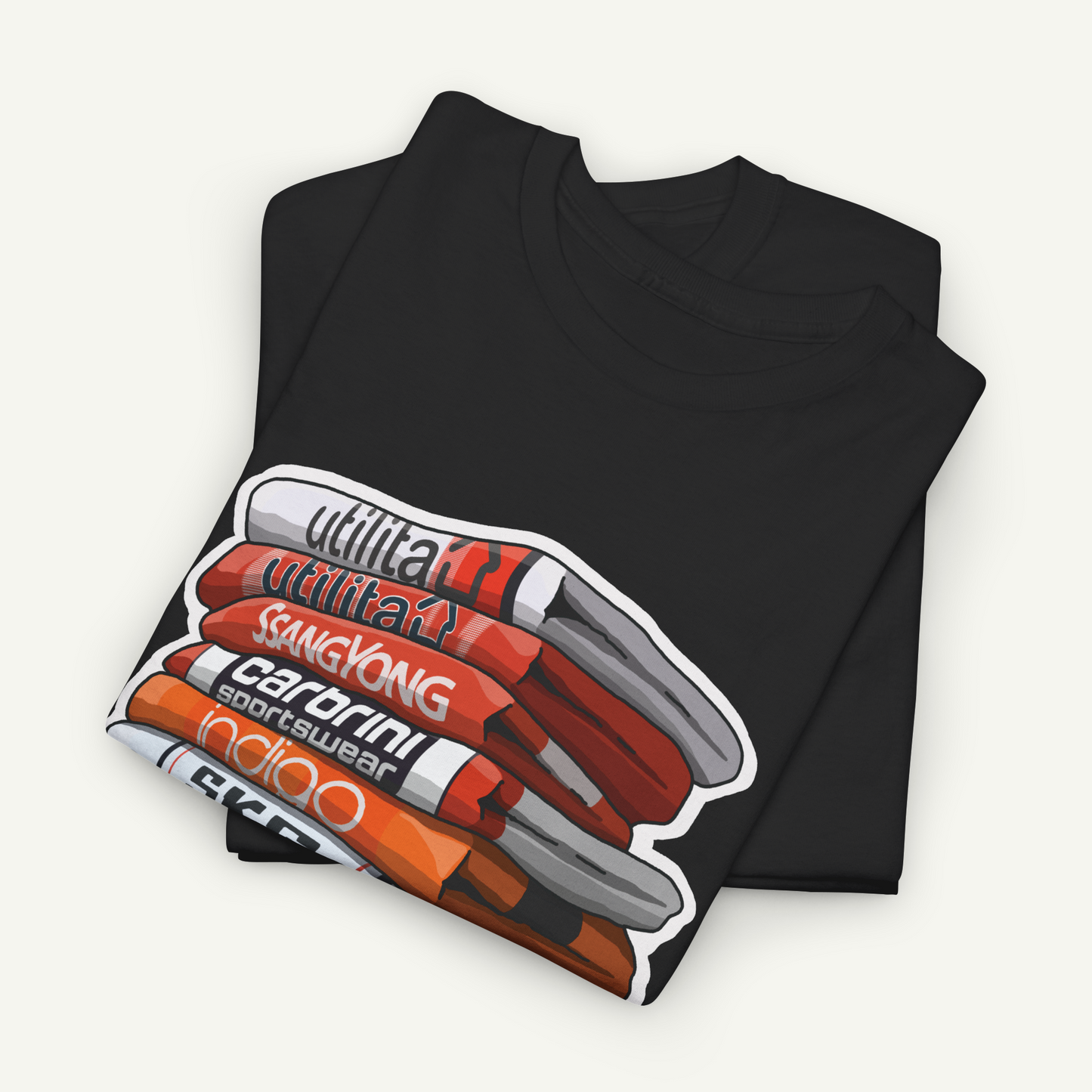 A black t-shirt with a graphic design depicting a stack of various colored pencils.