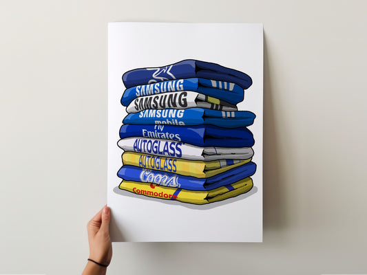 A hand is holding up a poster with a stack of blue and yellow towels, each towel displaying a different company logo.