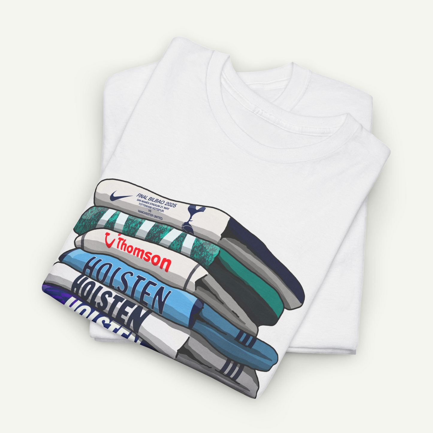 A white t-shirt with a graphic design depicting a stack of various colored shirts, including a blue and white striped shirt, a green and white striped shirt, and a white and blue striped shirt.