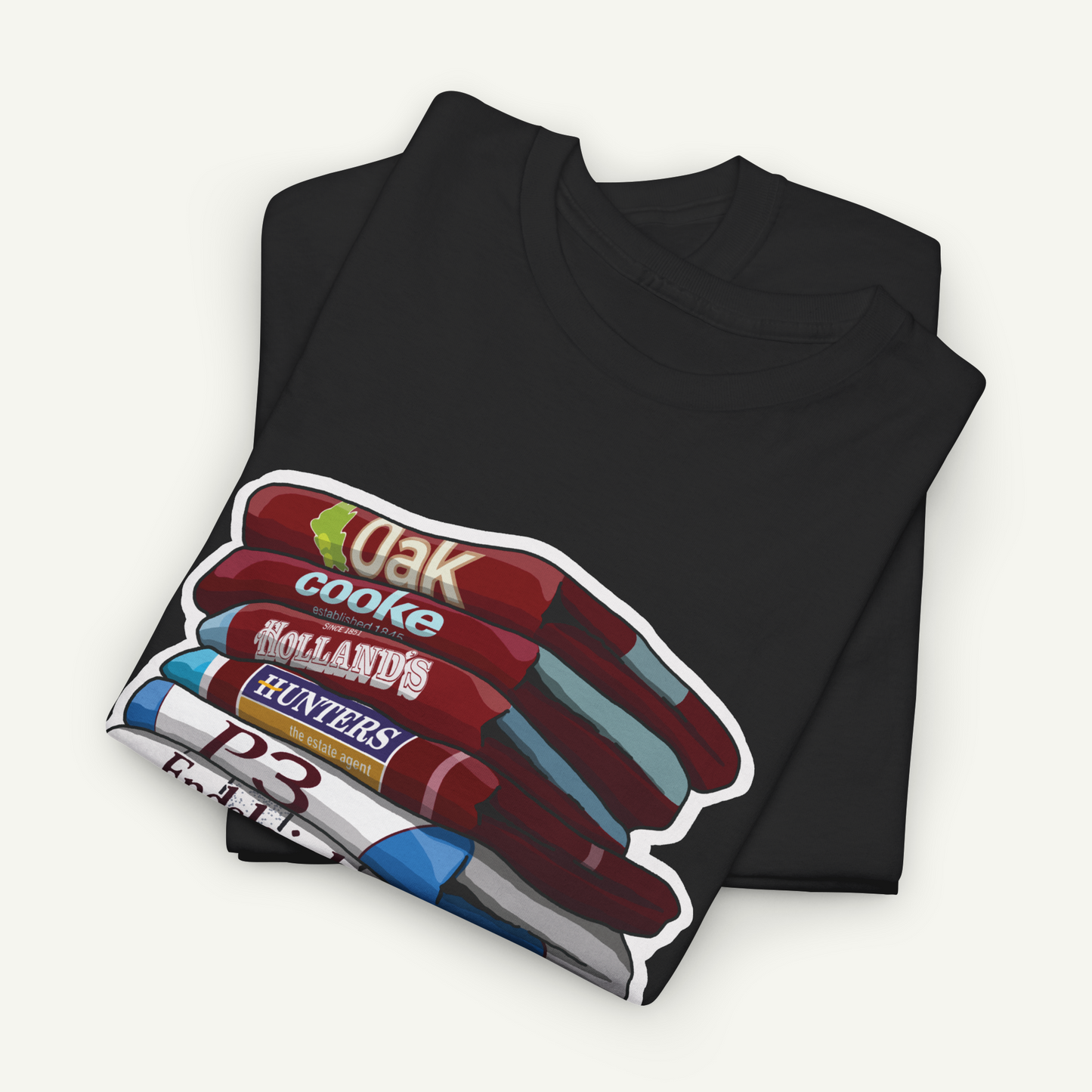 A black t-shirt with a graphic design depicting a stack of various colored pencils.