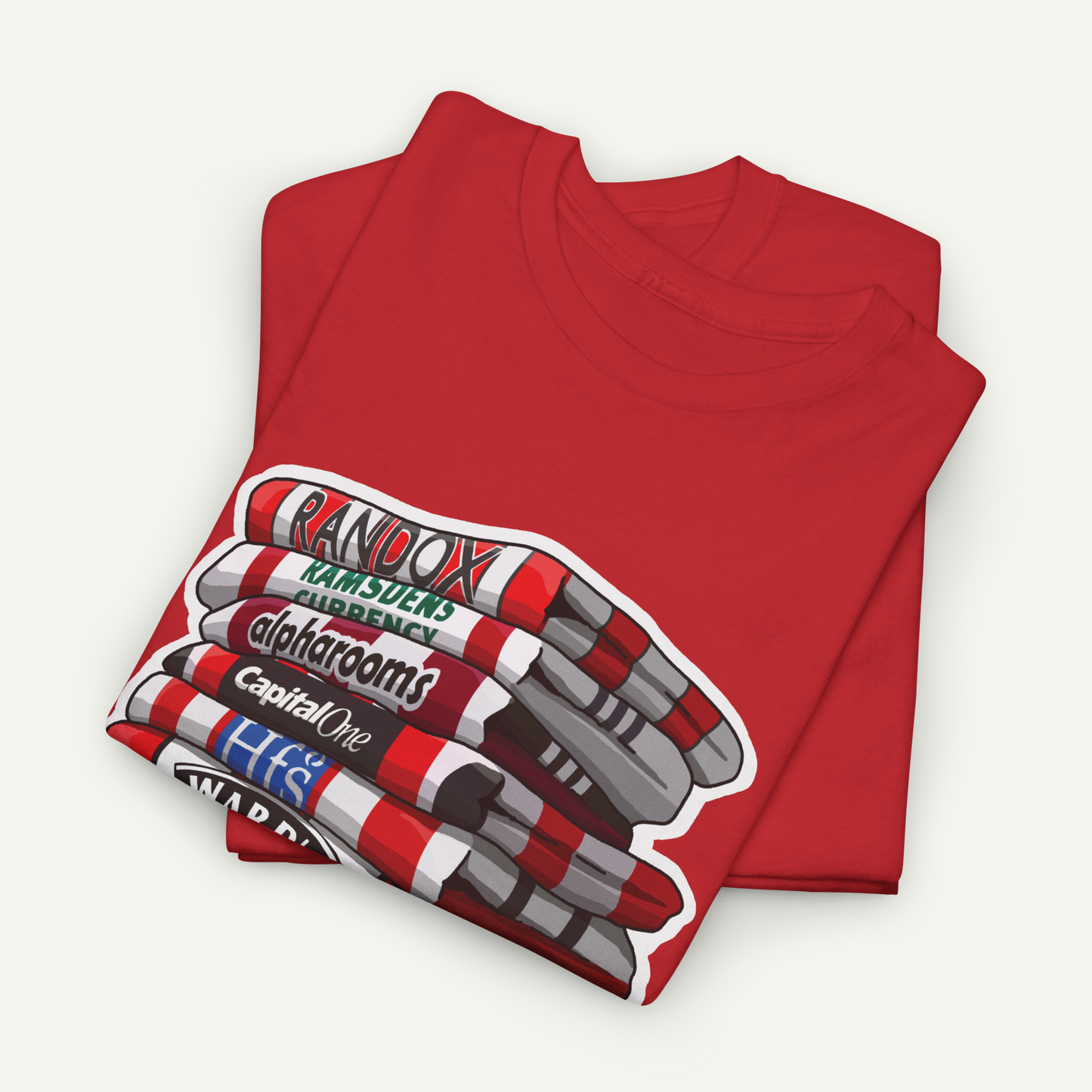 A red t-shirt with a graphic design depicting a stack of red and white striped objects, along with the text "RANDBOX RAMSEN'S ALOHORMS" and "CAPITAL ONE".