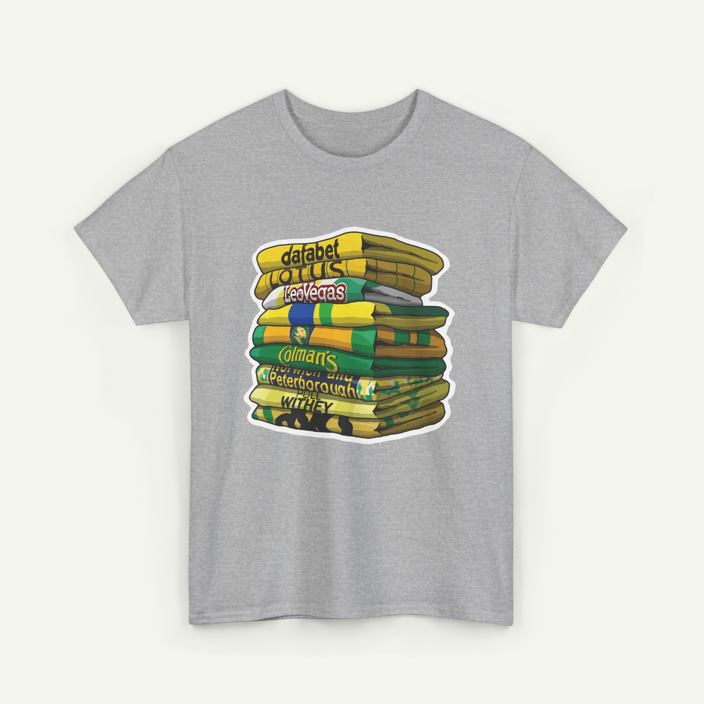 A gray t-shirt with a graphic design depicting a stack of colorful books or magazines.