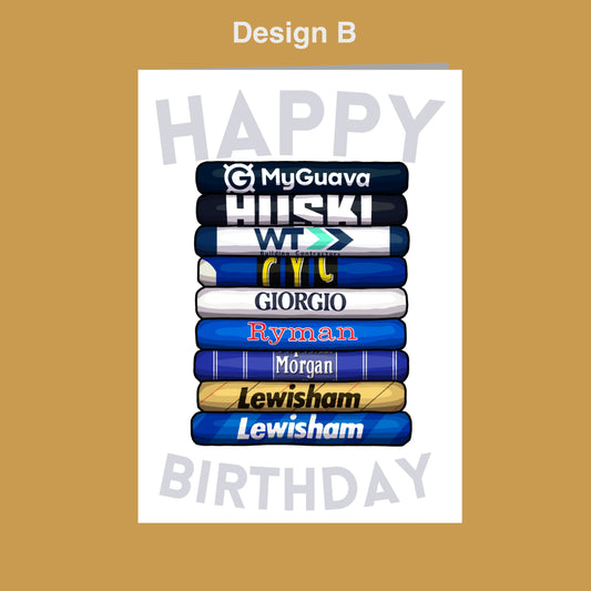 A birthday card with a stack of colorful books, each representing a different person's name. The card has a white background and the text "Happy Birthday" written in the center.