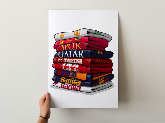 A hand is holding a poster with a stack of colorful towels representing different countries, including Qatar, Mexico, and Barilla.