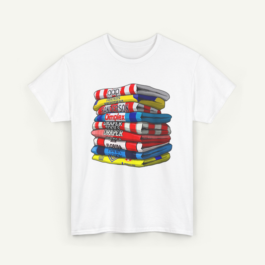 A white t-shirt with a colorful graphic design depicting a stack of various colored books or folders.