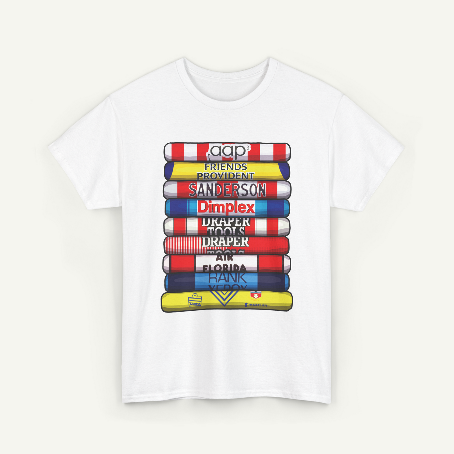 A white t-shirt with a graphic design depicting a stack of colorful books or book-like objects, each with a different title or label.