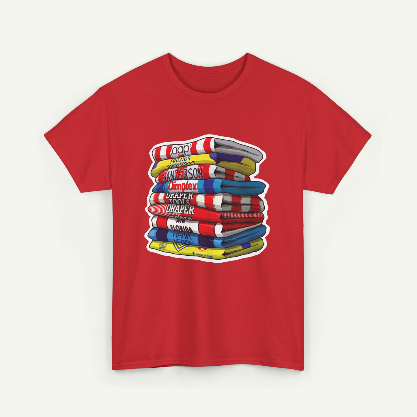 A red t-shirt with a graphic design depicting a stack of colorful books or magazines.