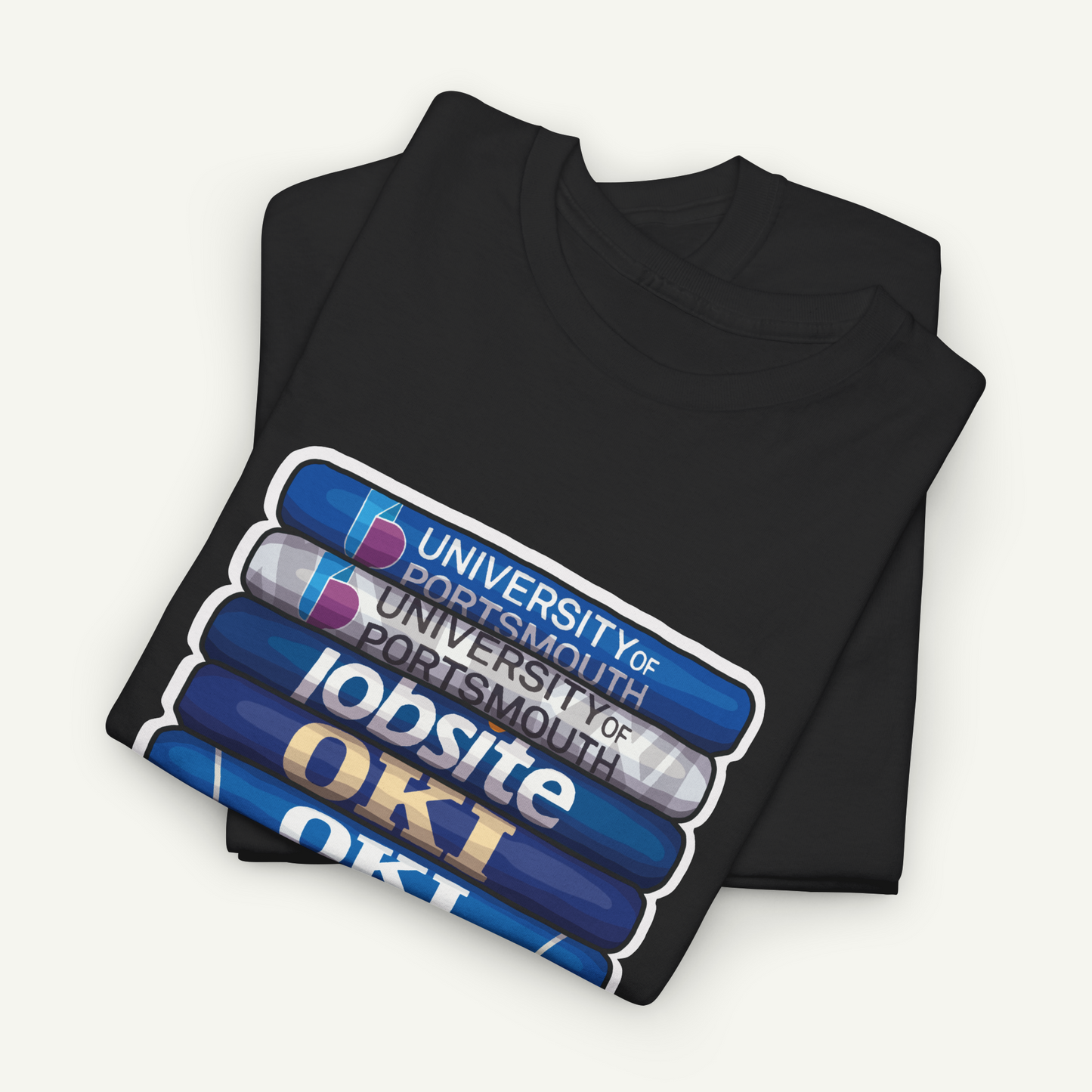 A black t-shirt with a graphic design featuring a stack of blue and white rectangular objects with text on them.