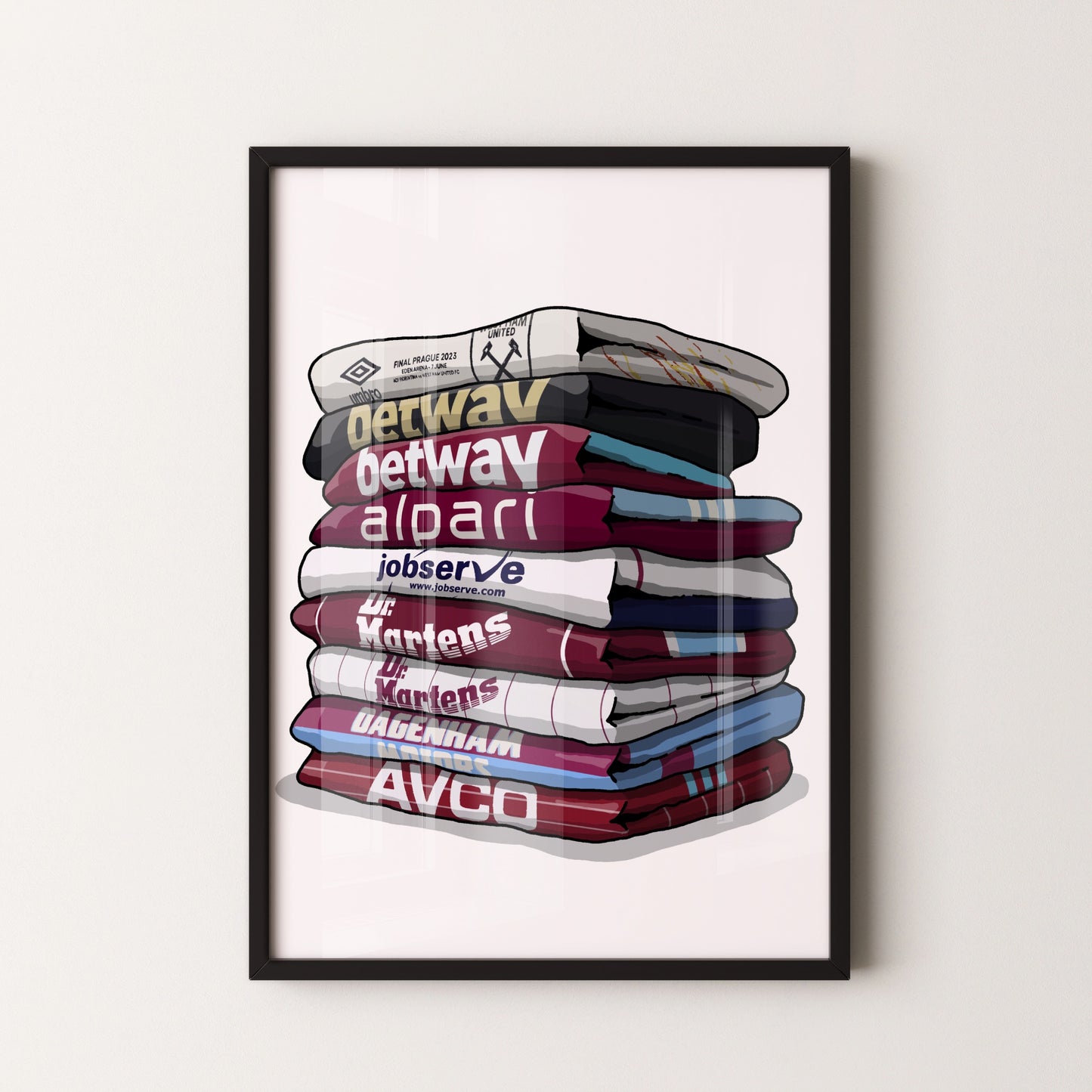 A framed illustration of a stack of various colored towels or blankets, with the text "getway" and "observe" visible on the topmost towel.