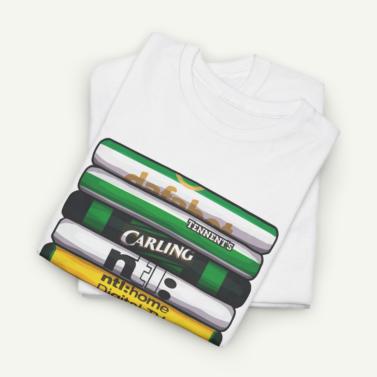 A white t-shirt with a graphic design depicting a stack of books or magazines with various text and logos printed on them.
