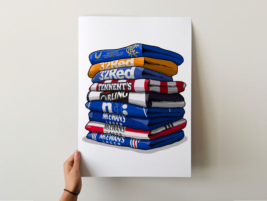 A hand is holding a poster with a stack of colorful towels, each with a different text label.