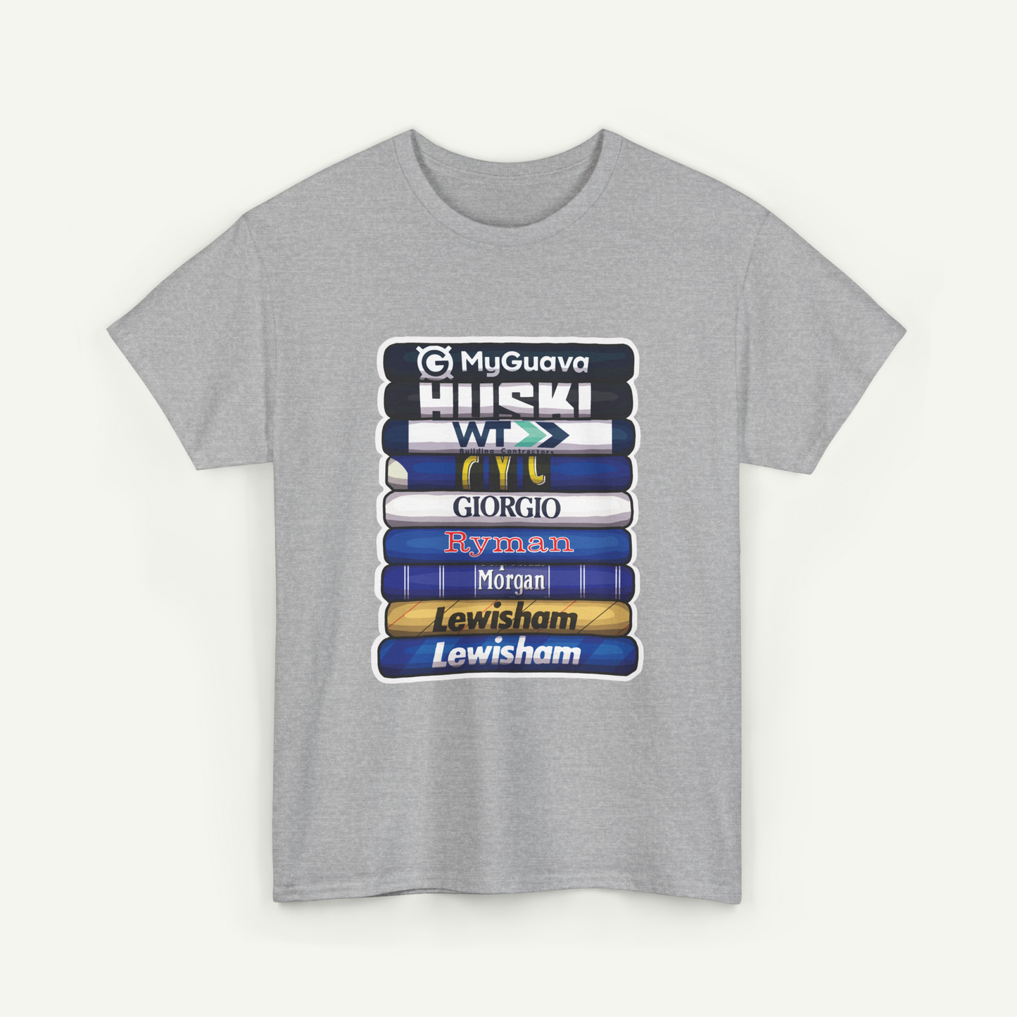 A gray t-shirt with a graphic design featuring a stack of books with various text on the spines.