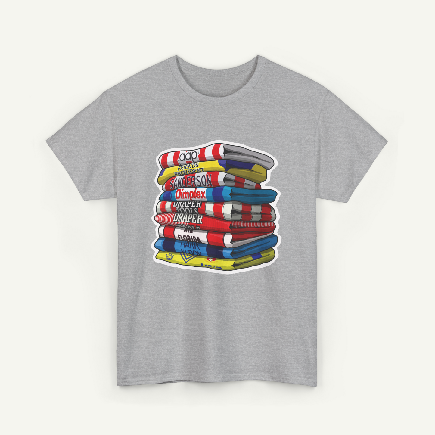 A gray t-shirt with a graphic design depicting a stack of colorful books or magazines.
