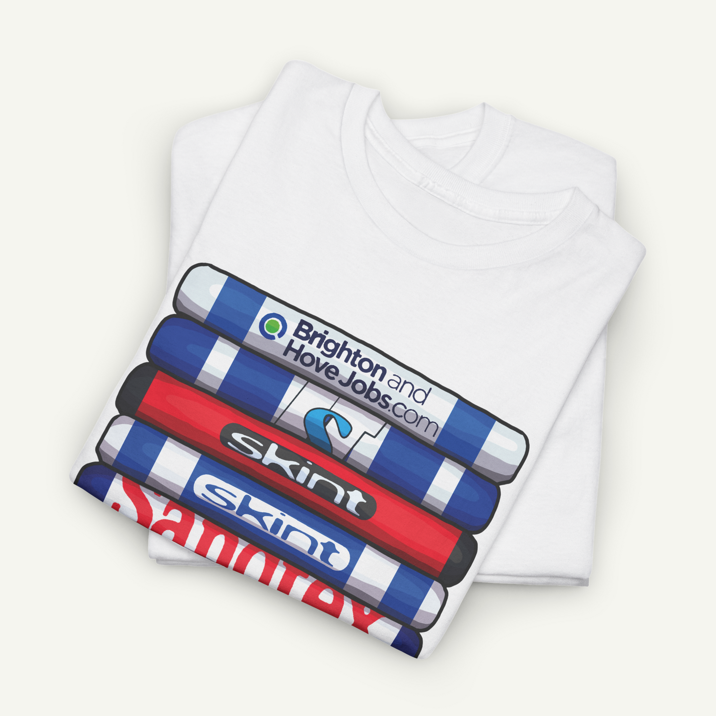 A white t-shirt with a graphic design featuring a stack of colorful markers or highlighters with various text and logos printed on them.