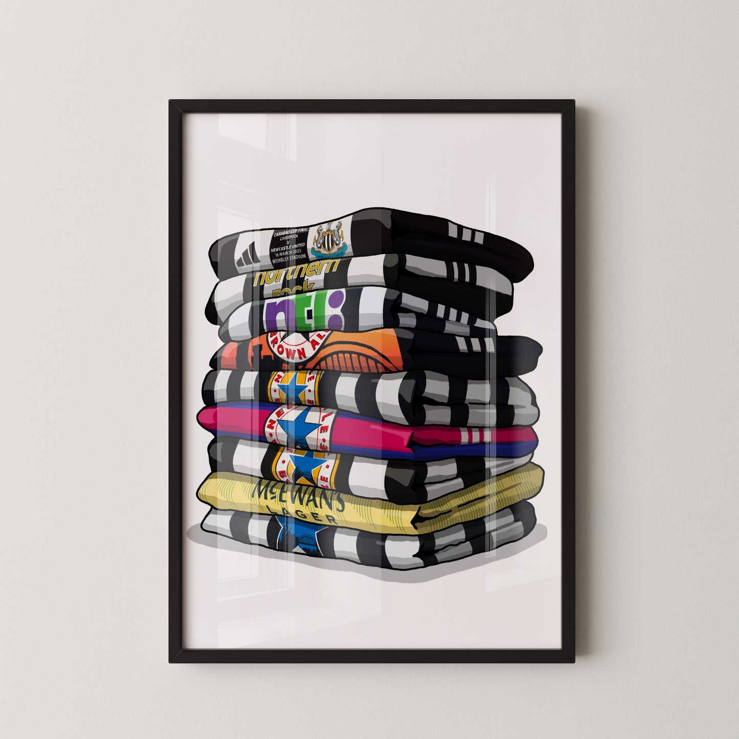 A framed illustration of a stack of colorful towels or blankets, each with a unique design or pattern.