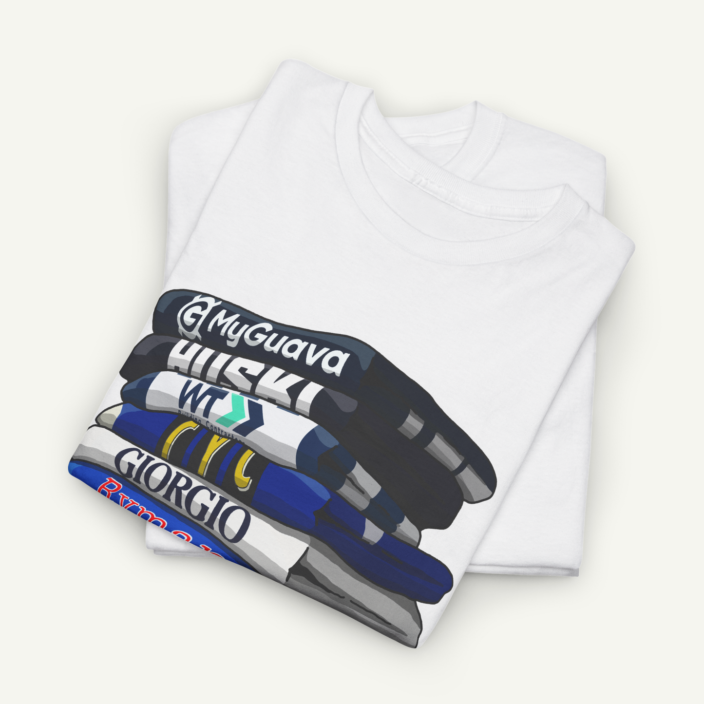 A white t-shirt with a graphic design depicting a stack of books or bookshelves with various colored books on them.