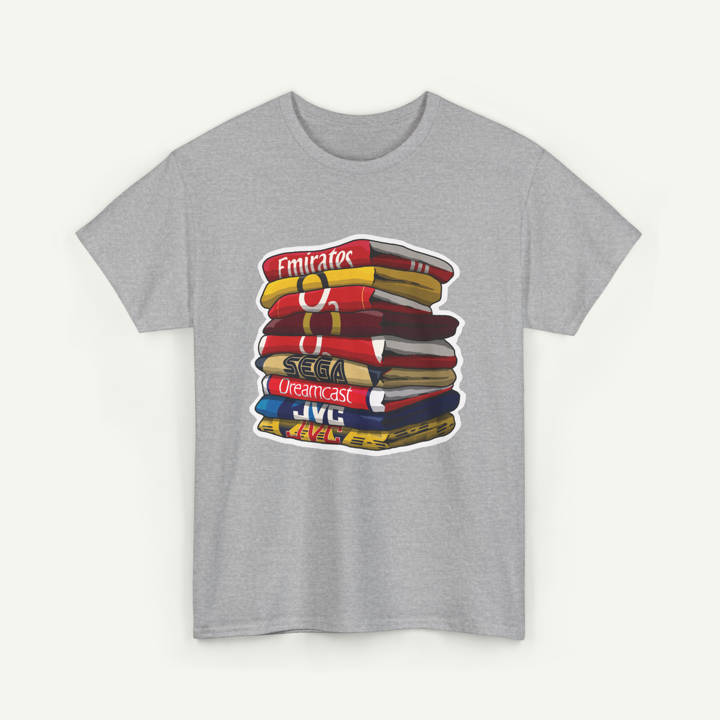 A gray t-shirt with a graphic design depicting a stack of colorful books.