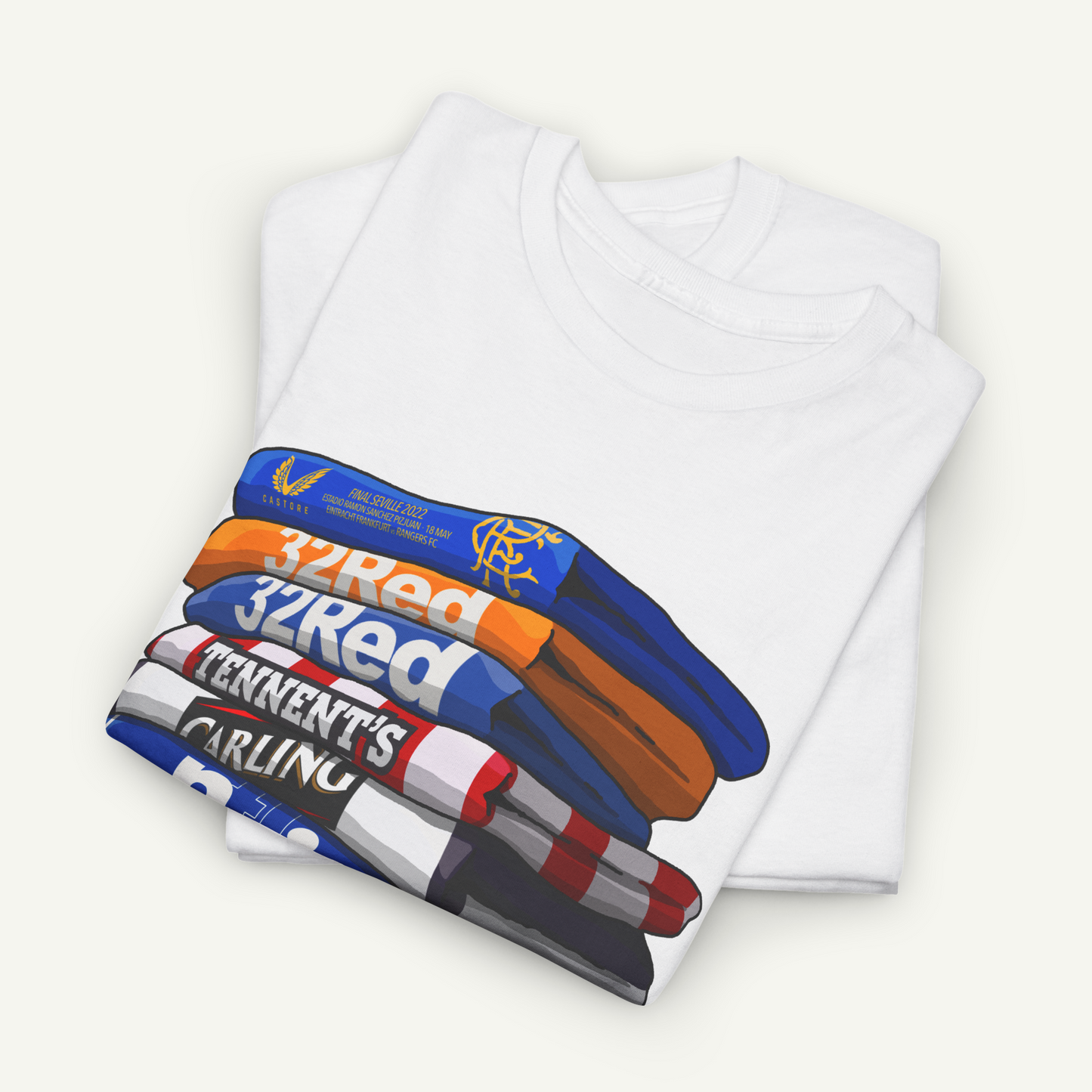A white t-shirt with a graphic design depicting a stack of colorful books or books with the text "32Red" printed on them.