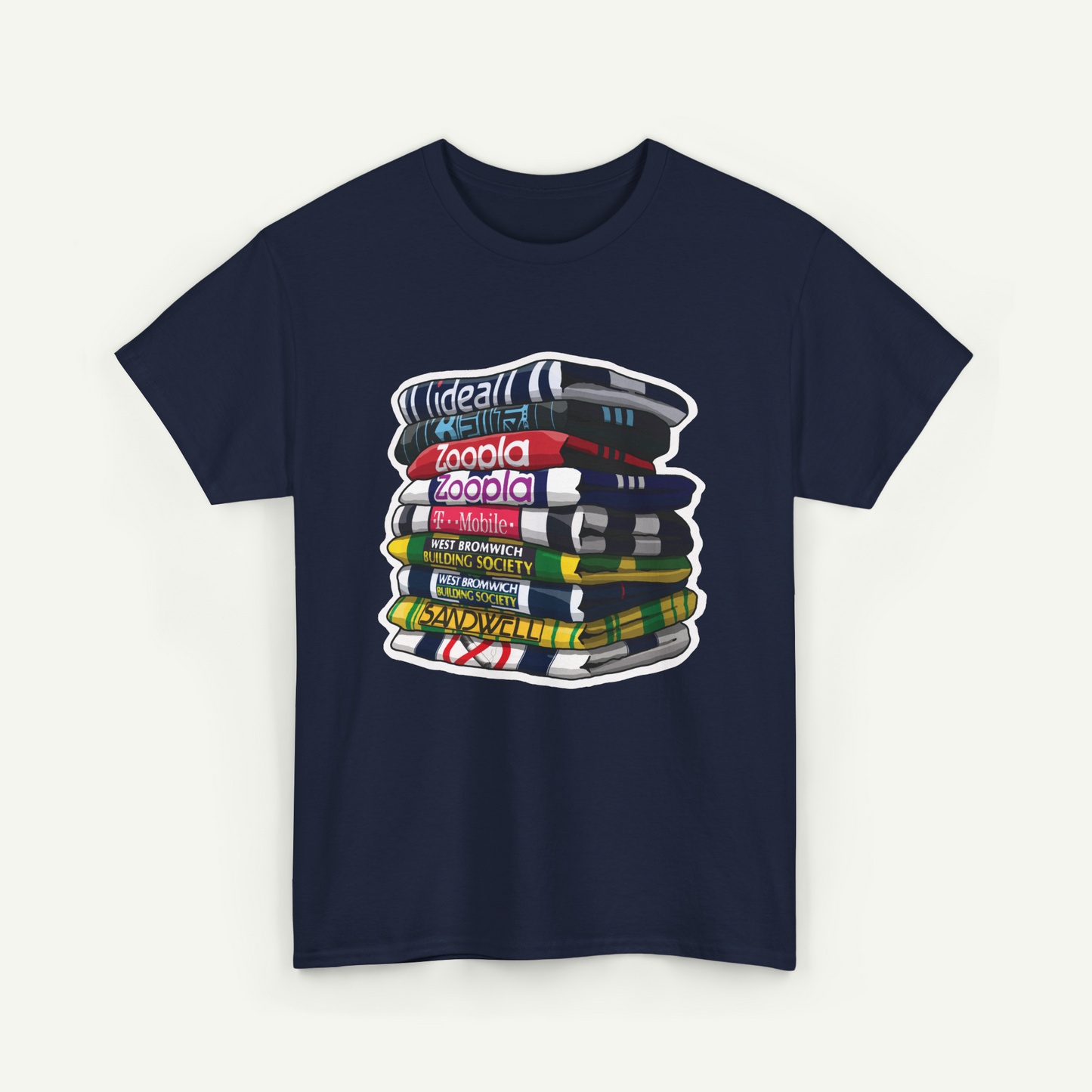 A navy blue t-shirt with a graphic design depicting a stack of colorful books.