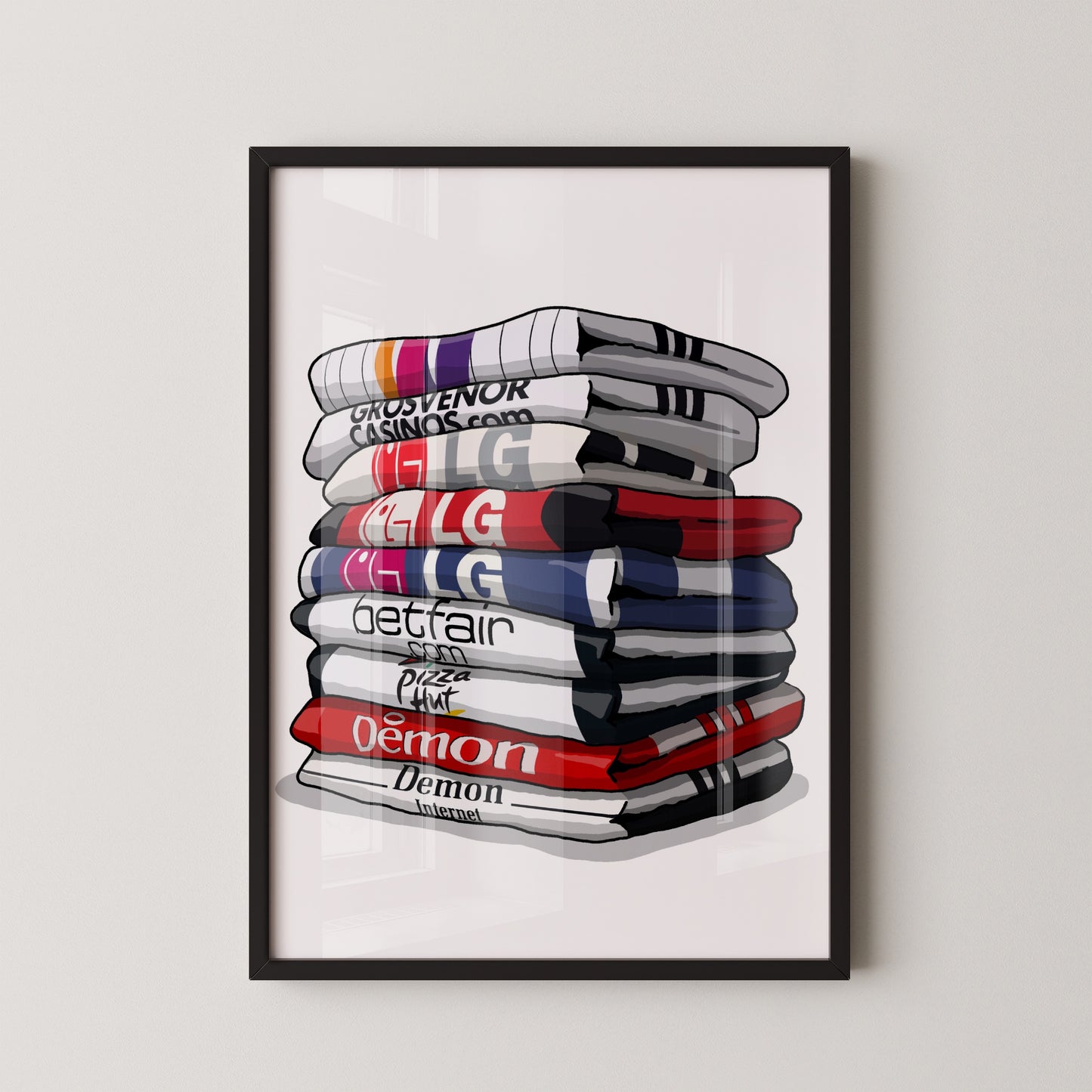 A framed illustration of a stack of books or magazines with various colorful covers, including titles like "GROSSVENOR CASINO.COM", "LG", "betfair", "Pizza Hut", and "DEMON".
