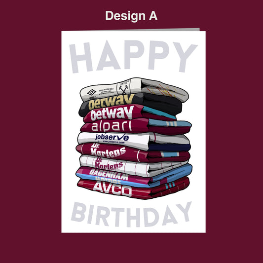 A stack of colorful towels with the text "Happy Birthday" written on them.