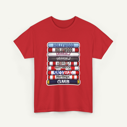 A red t-shirt with a graphic design depicting a stack of various colored tubes or tubes with text on them, representing different cities or brands.
