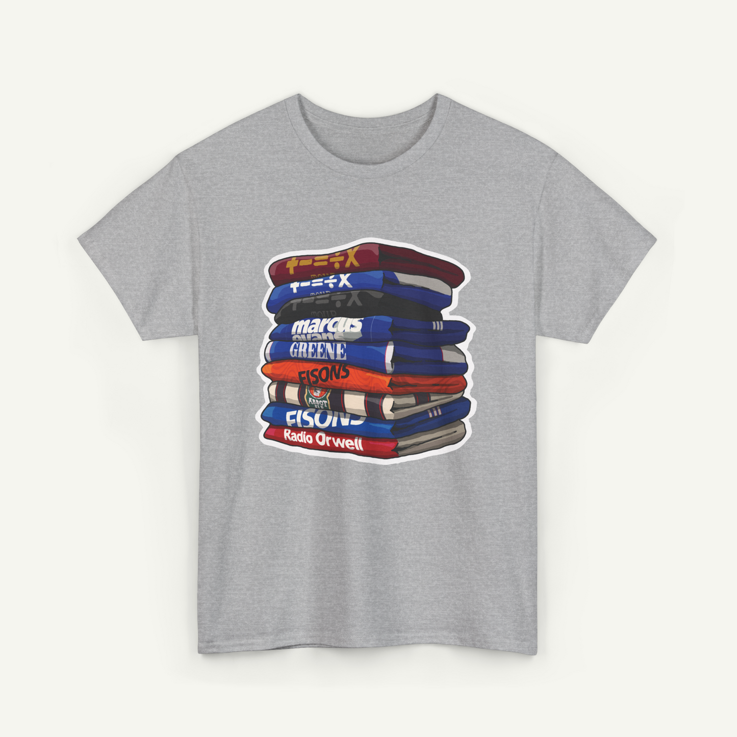 A gray t-shirt with a graphic design depicting a stack of colorful books.