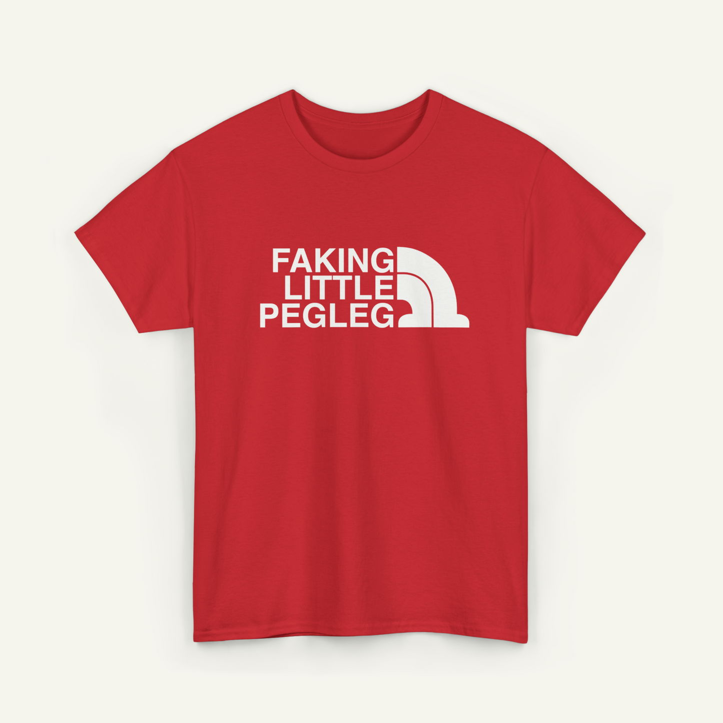 A red t-shirt with the text "FAKING LITTLE PEGLEG" printed on it.