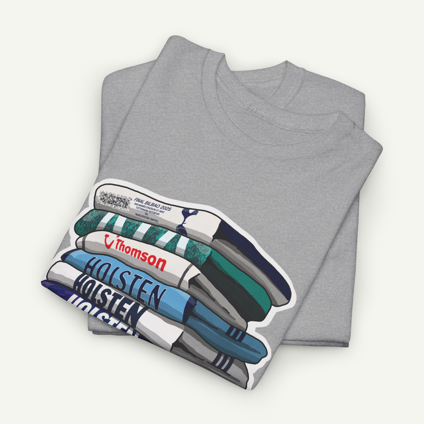 A gray t-shirt with a graphic design depicting a stack of books or magazines with the text "Holsten" printed on them.