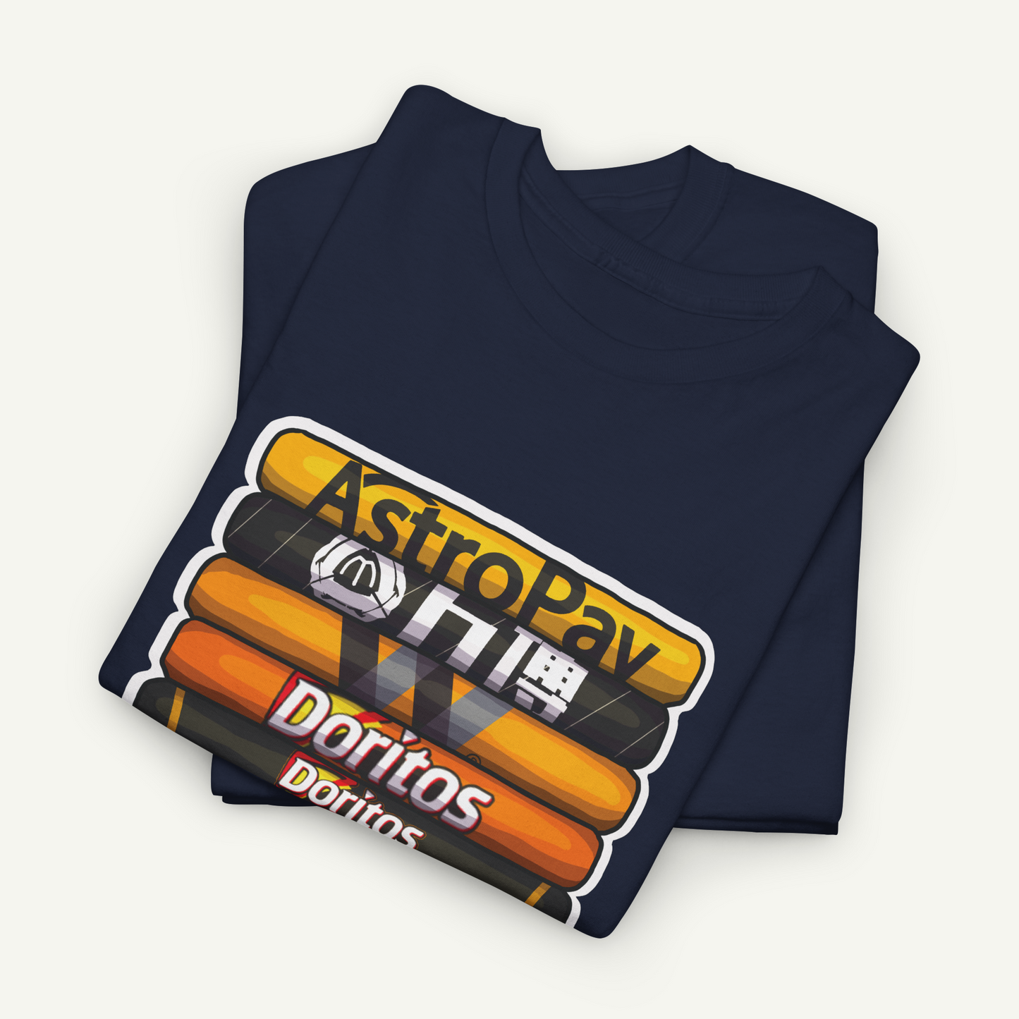 A dark blue t-shirt with a graphic design featuring stacked orange and yellow bars, along with the text "AstroPay" and "Doritos" printed on it.