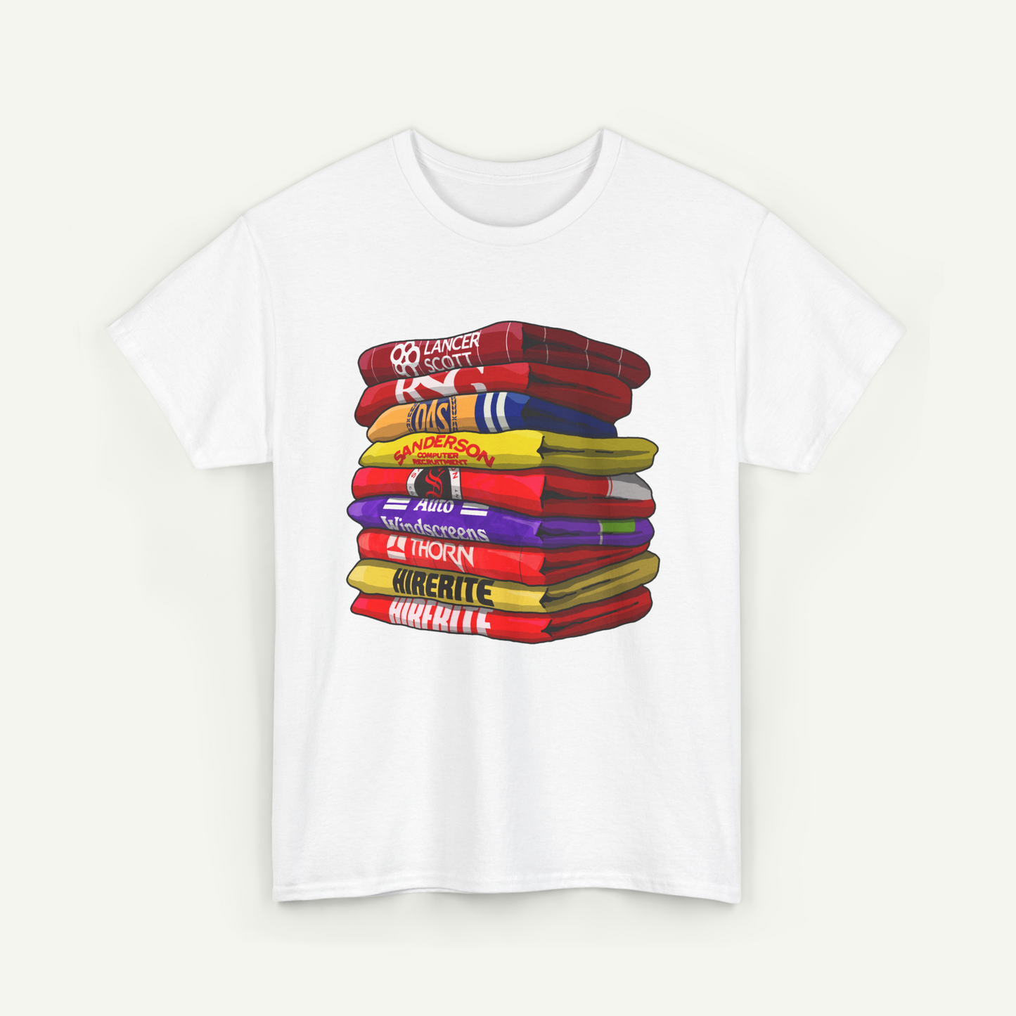 A white t-shirt with a colorful graphic design depicting a stack of books or books.