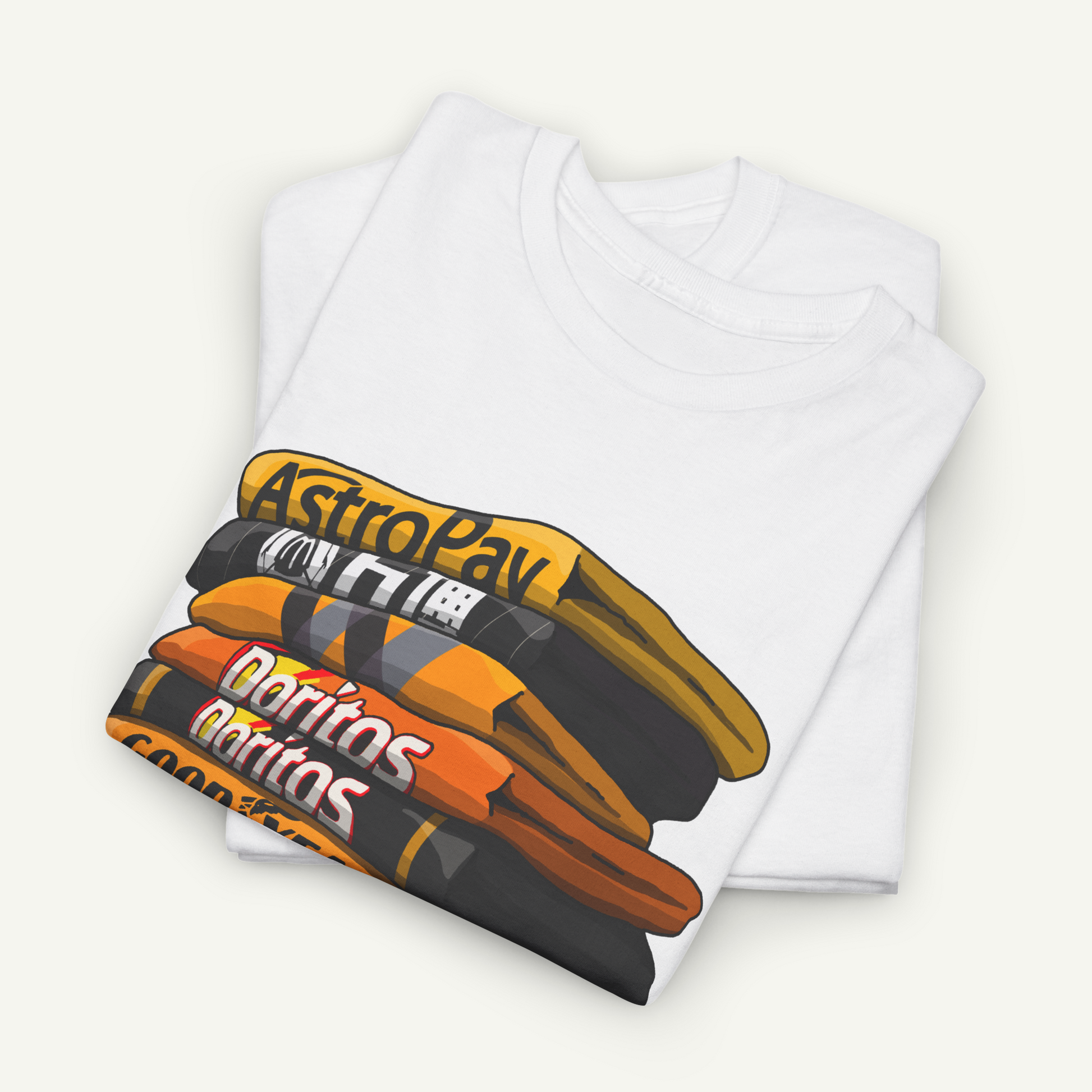 A white t-shirt with a graphic design depicting a stack of colorful books or magazines.