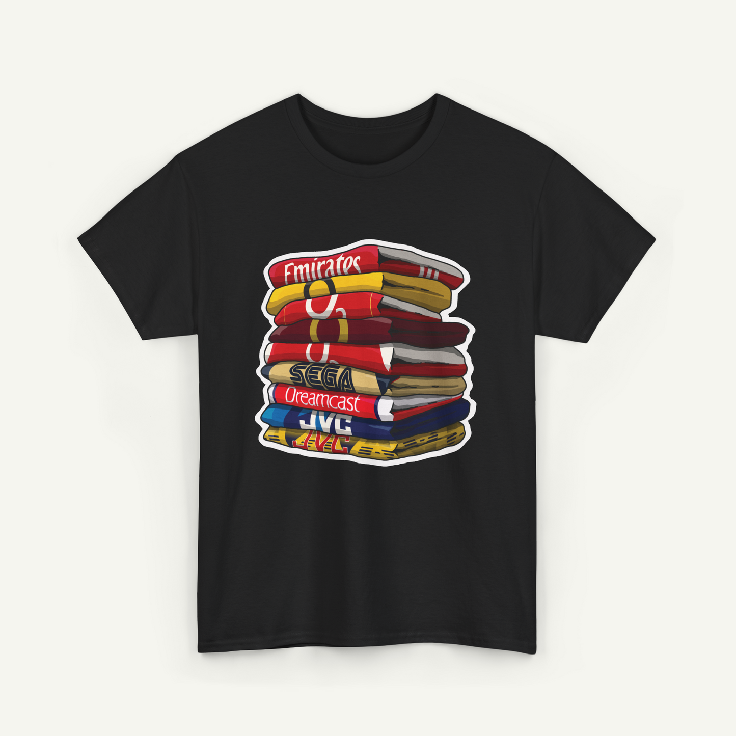A black t-shirt with a graphic design depicting a stack of colorful books or magazines.