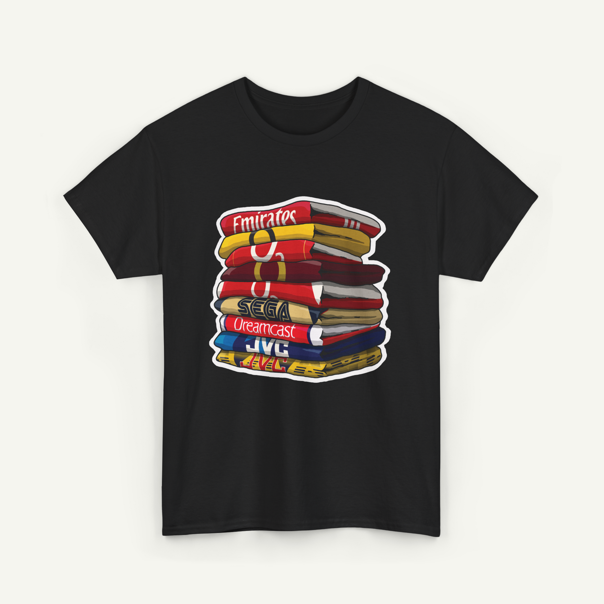 A black t-shirt with a graphic design depicting a stack of colorful books or magazines.