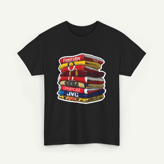 A black t-shirt with a graphic design depicting a stack of colorful books or magazines.