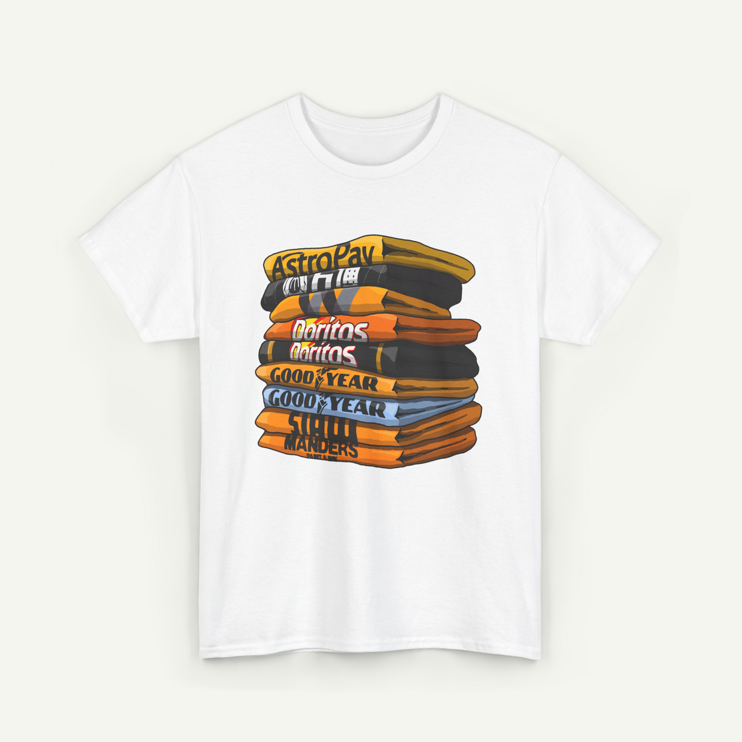 A white t-shirt with a graphic design depicting a stack of colorful books or magazines.