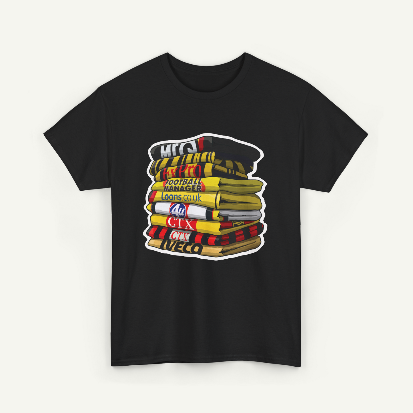 A black t-shirt with a graphic design depicting a stack of books or magazines with various text and logos on the covers.