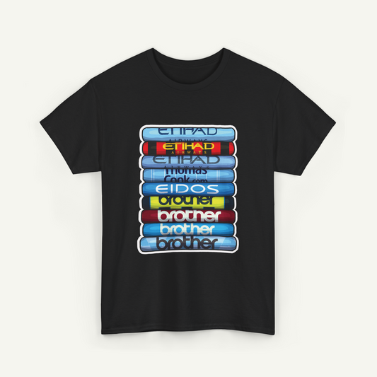 A black t-shirt with a graphic design featuring a stack of colorful books or cylinders with the text "Etihad" written on them.