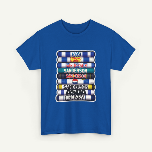 A blue t-shirt with a graphic design featuring a stack of colorful books or magazines with the text "Sanderson" printed on them.