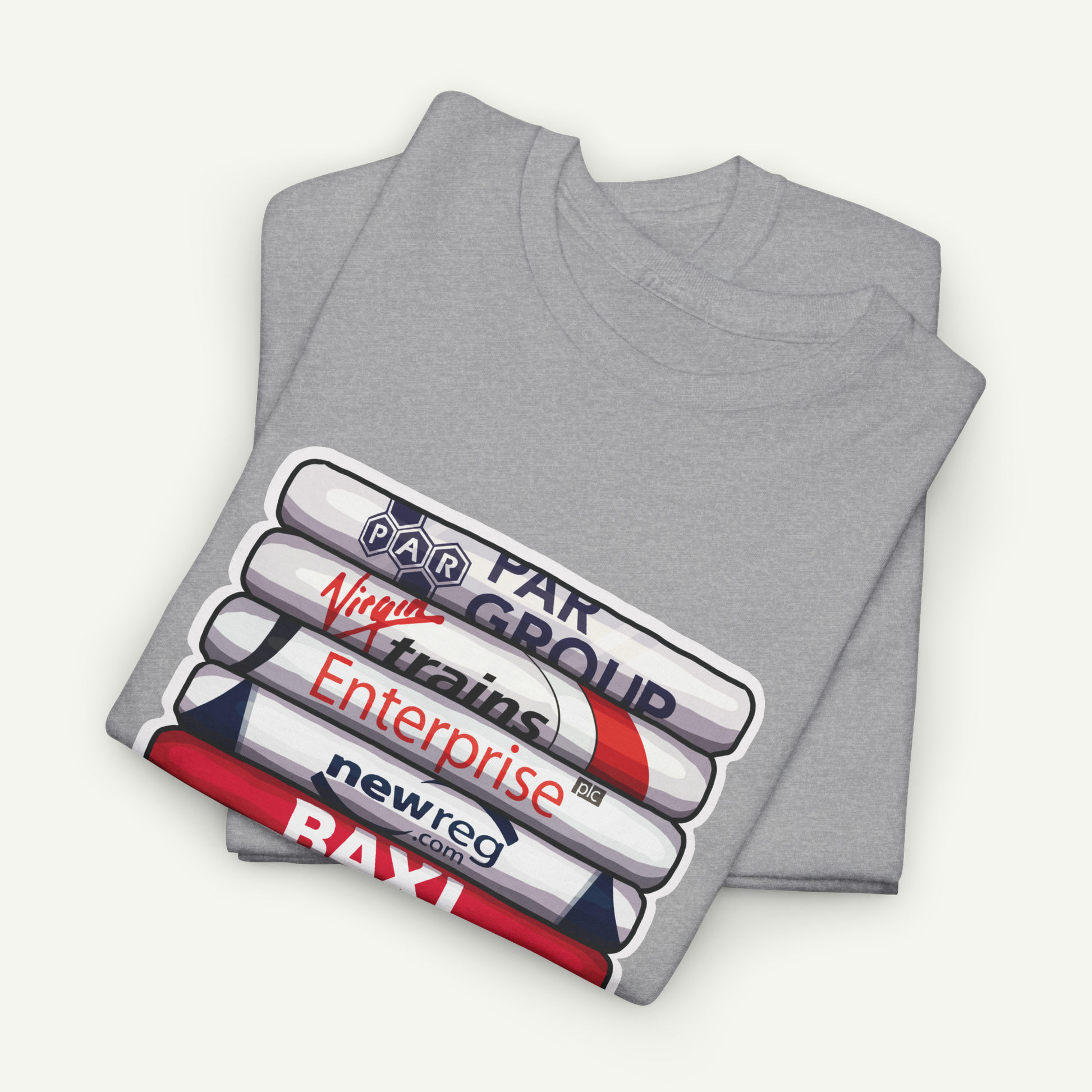 A gray t-shirt with a graphic design featuring a stack of books or cylinders with various text and logos printed on them.